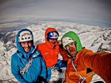 Sagwand, Austria - Peter Ortner, David Lama and Hansjörg Auer on the summit of Sagwand after the first winter ascent of the route Schiefer Riss.