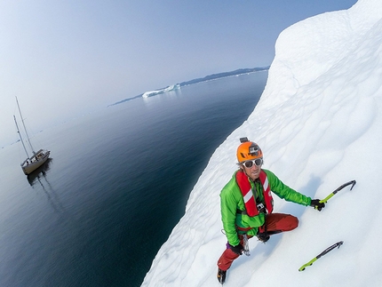 Klemen Premrl and Aljaz Anderle climbing iceberg in Greenland