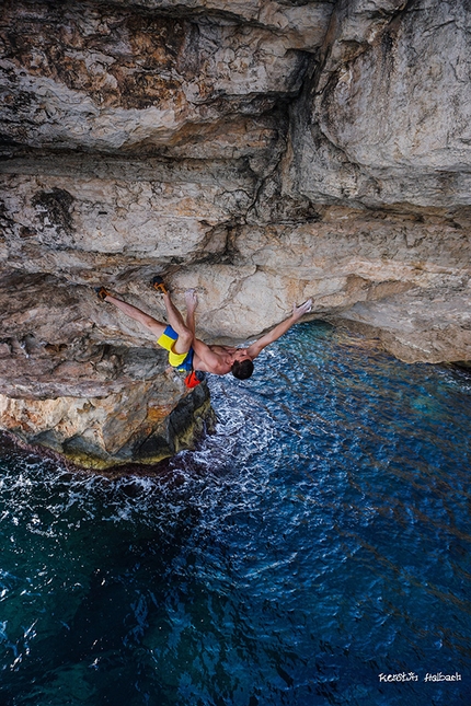 Jernej Kruder, Es pontas, Mallorca - Jernej Kruder making the first repeat of the Deep water solo climb Pontax 8c,  Es pontas, Mallorca