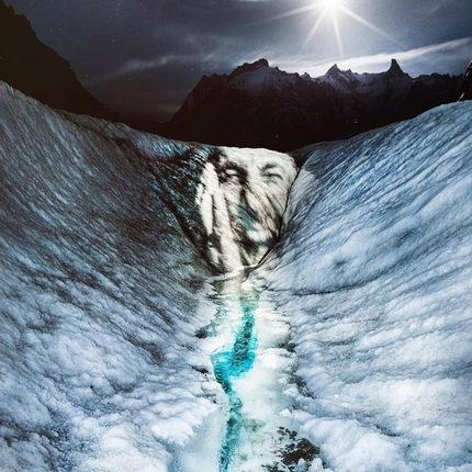 Ice Scream, Philippe Echaroux, street art, Mer de Glace - The face of Jeff Mercier in 'Ice Scream' projected by French artist Philippe Echaroux onto the Mer de Glace, Mont Blanc