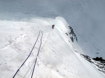 Gasherbrum II - Winter 2011 - Ascending to C2, Cory Richards waits at the belay...