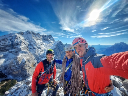 Torre Trieste, Civetta, Alessandro Baù, Alessandro Beber, Nicola Tondini - Alessandro Beber, Alessandro Baù and Nicola Tondini on the summit of Torre Trieste in Civetta after having completed their new climb called Enigma