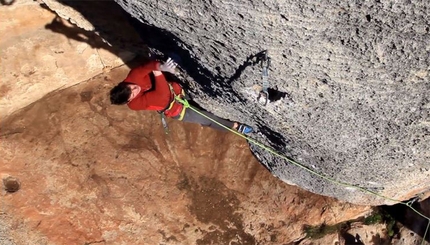 Stefano Carnati climbing Hyaena at Finale, Italy