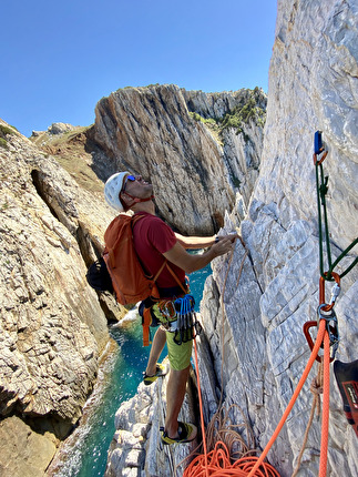 Faraglione di Buggerru, Sardinia, Maurizio Oviglia, Marco Bigatti - Marco Bigatti climbing 'Kind of Blue' on the Faraglione di Buggerru in Sardinia