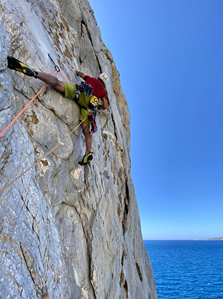 Faraglione di Buggerru, Sardinia, Maurizio Oviglia, Marco Bigatti - Marco Bigatti climbing 'Kind of Blue' on the Faraglione di Buggerru in Sardinia
