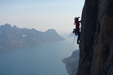 Torsukattak Fjord, Greenland, Miška Izakovičová, Callum Johnson, Tim Miller, Simon Smith - Torsukattak Fjord, Greenland: Miška Izakovičová following a sustained pitch on the headwall of Mussels for Tea, Packrafts in the Sea