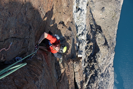 Torsukattak Fjord, Greenland, Miška Izakovičová, Callum Johnson, Tim Miller, Simon Smith - Torsukattak Fjord, Greenland: Simon Smith on the headwall of Mussels for Tea, Packrafts in the Sea