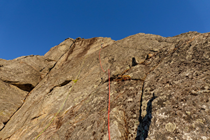 Stetind Norway, Dave MacLeod, Calum Muskett - Calum Muskett making the first ascent of 'Line Dancing' (800m, E5 6b) on the SW Face of Stetind in Norway, 09/2024