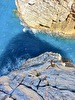 Il Faraglione di Buggerru in Sardegna e il mare sotto le scarpette. Di Maurizio Oviglia