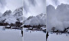 Huge avalanche powder cloud in Val Veny, Italy